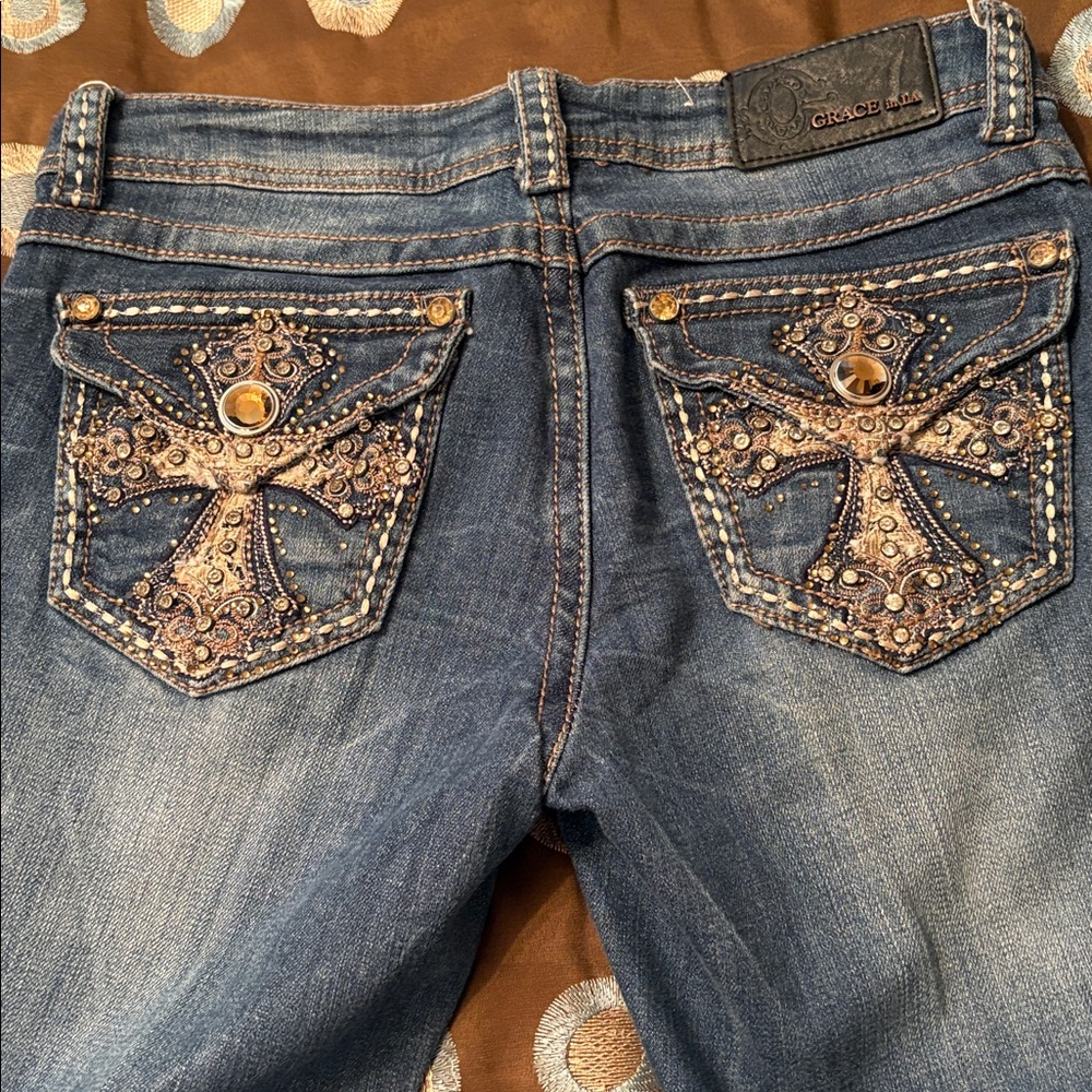 Grace Blue Flared Jeans with Embellished Pockets